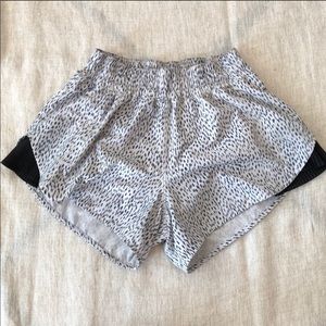 Size 4 lululemon white& black lined running shorts